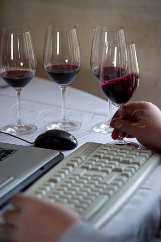 Typing notes at En Primeur tasting of the 2009 vintage  Bordeaux France