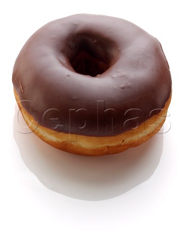 A chocolate doughnut on a white background