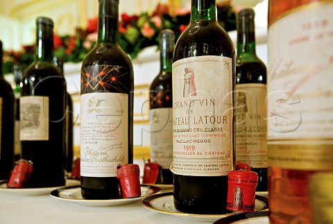 Bottles of 1959 Premier Cru Bordeaux wines at a tasting