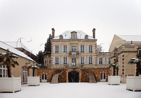 Snow falling on the house of Bollinger at Ay Marne France  Champagne