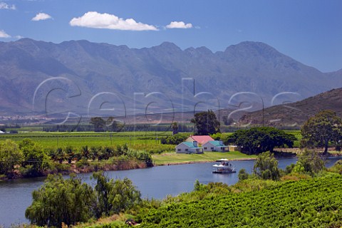 Tourist boat of Viljoensdrift winery on the Breede River with the Langeberg Mountains in distance Robertson Western Cape South Africa  Breede River Valley