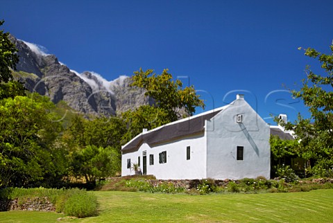 Cape Dutch house of Boekenhoutskloof with the Franschhoek Mountains beyond   Franschhoek Western Cape South Africa Franschhoek Valley