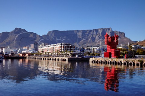 The Coca Cola crateman 4200 crates on the VA Waterfront with Table Mountain beyond Cape Town Western Cape South Africa