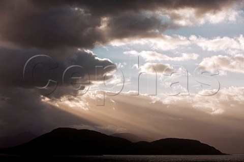 Early morning sunlight and storm clouds over the Chilean Fjords Patagonia Chile