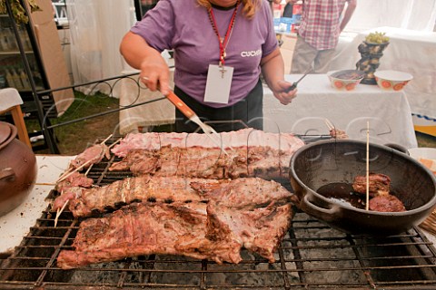 Cooking pork ribs on a barbecue during La Fiesta de la Vendimia in Santa Cruz Colchagua Valley Chile
