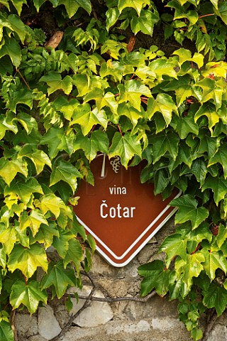 Sign on wall of the Cotar winery Gorjansko Komen Slovenia   Kras