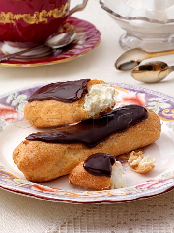 Eclairs in a table setting