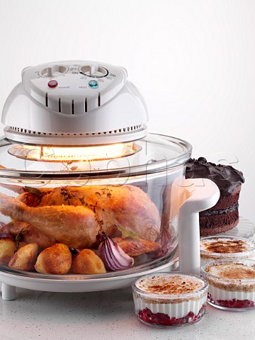 Halogen oven with chicken cooking