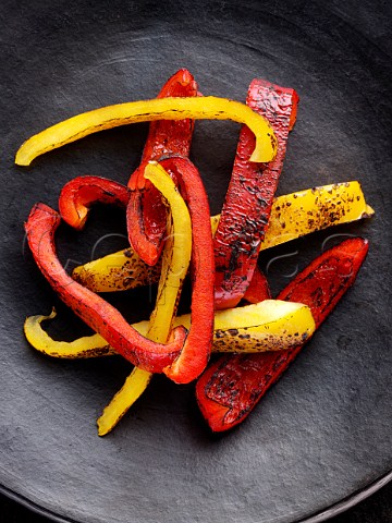 Red and yellow pepper strips flamed