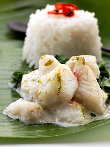 Individual portion of Cambodian fish amok on a palm leaf