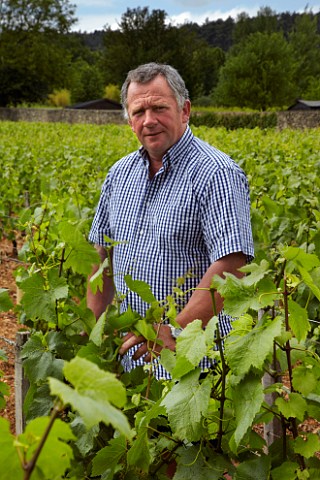 Rgis Bouvier amidst Chardonnay vines in his Clos du Roy vineyard Domaine Rgis Bouvier MarsannaylaCte CtedOr France  Marsannay
