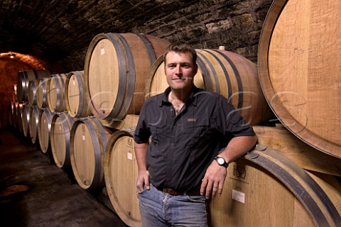 Laurent Fournier with different sizes of barrels in cellar of Domaine Jean Fournier  MarsannaylaCte CtedOr France  Marsannay