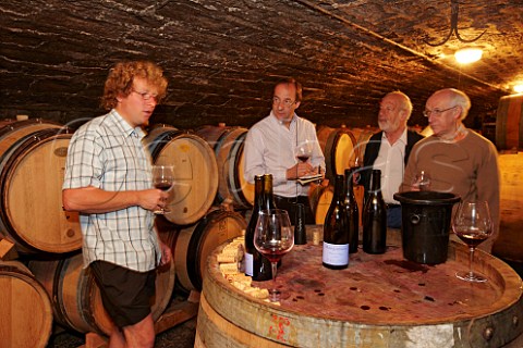 Sylvain Pataille conducts a tasting in his cellar for members of The Athenaeum Club Domaine Sylvain Pataille MarsannaylaCte CtedOr France  Marsannay