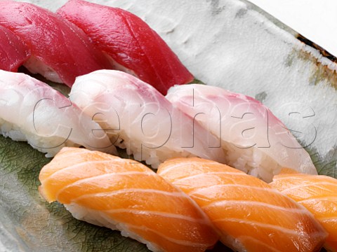 Tuna sushi with rice smoked salmon