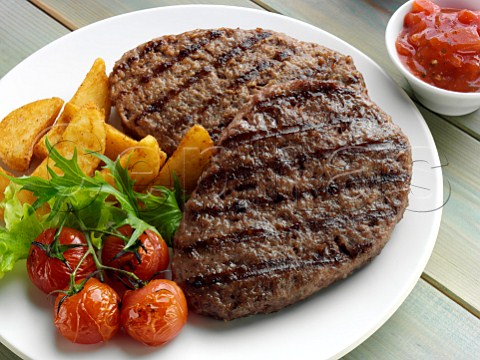 Grilled steak wedges and tomatoes