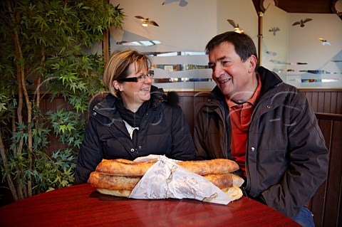French couple chatting in a caf with baguettes on their table Le PerreuxsurMarne ValdeMarne France