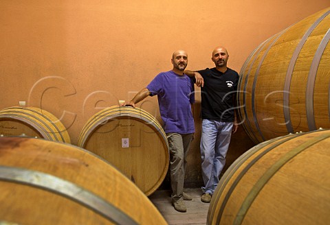 Gianpaolo right  Romolo Pira in cellar of Pira Luigi Serralunga dAlba Piemonte Italy    Barolo