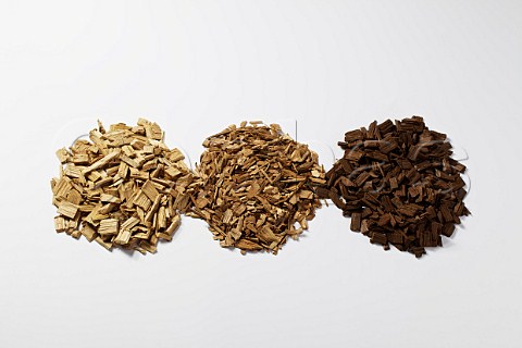 Oak chips of different toast levels for imparting oak characteristics to inexpensive wine where the cost of new oak barrels would be prohibitive