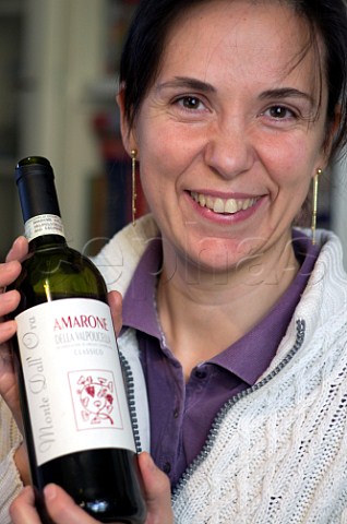 Alessandra Venturini with a bottle of her Monte Dall Ora Amarone San Pietro in Cariano Veneto Italy  Amarone  Valpolicella