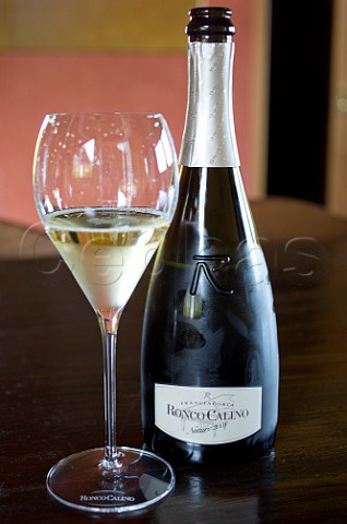 Bottle and glass of Ronco Calino Nature 2008 Torbiato Lombardy Italy Franciacorta
