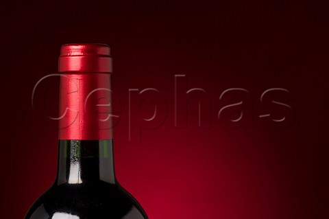 Capsule on bottle of red wine