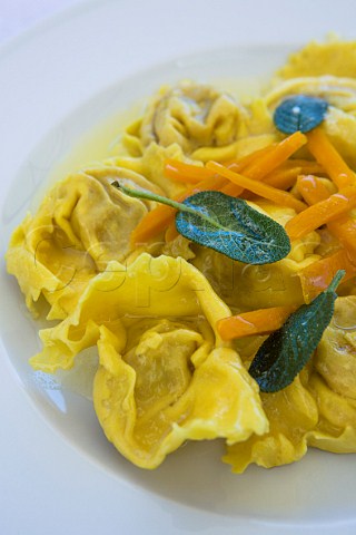 Large ravioli with pumpkin butter and sage