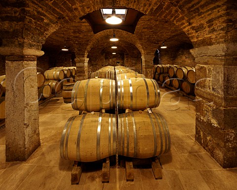 Barrel ageing in the 12thcentury Cistercian cellars of Domaine de la Tournelle Arbois Jura France
