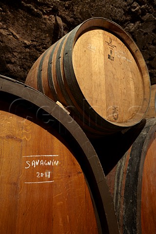 Foudres of Savagnin and barrel of Pinot Noir in cellar of Jacques Puffeney MontignylsArsures Jura France Arbois