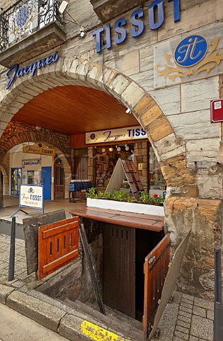 Entrance to the old cellar beneath the shop of Domaine Jacques Tissot  under the arcades by Place de la Libert  Arbois Jura France