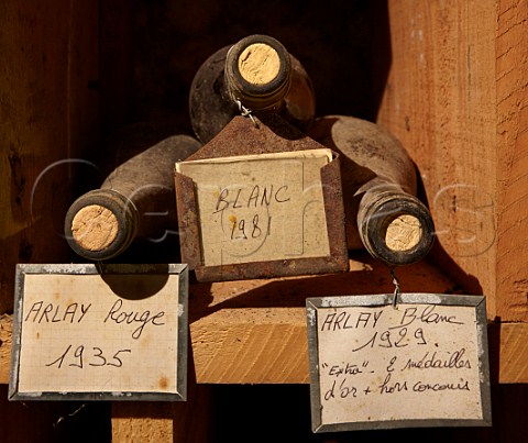 Old bottles in cellar of Caves Jean Bourdy Arlay Jura France  Ctes du Jura