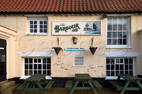 The Harbour Inn at Southwold Harbour showing the 1953 flood level Suffolk England