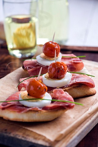 Cherry tomato egg and ham pintxos