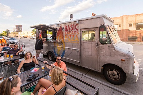 Pizza Van does business outside a bar Denver Colorado USA