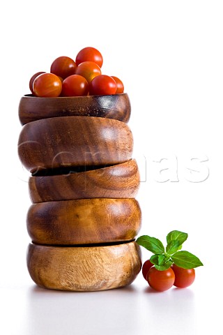 Cherry tomatoes in wooden bowl