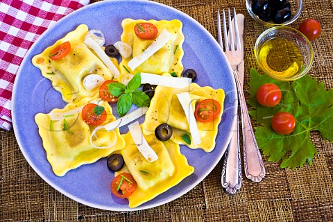 Ravioli with tomatoes and Parmesan cheese