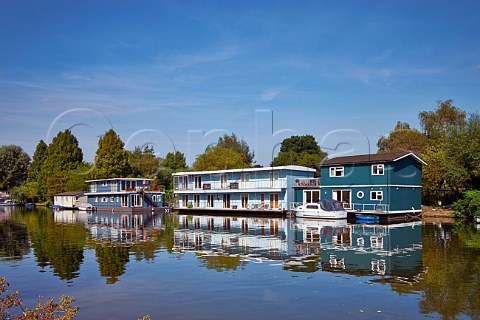 Houseboats on the River Thames at Taggs Island East Molesey Surrey England