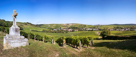 Stone cross in vineyards above Bu with Clos de la Poussie beyond the village centre Cher France   Sancerre