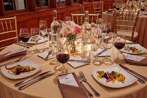 Tables laid for dinner in the Carriage House of Trump Winery  Charlottesville Virginia USA