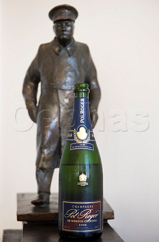 Bottle of 2002 Pol Roger Cuve Sir Winston Churchill with statuette of him Champagne Pol Roger pernay Marne France