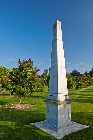 Stone obelisk in the gardens of Jenkyn Place Vineyard Bentley Hampshire England