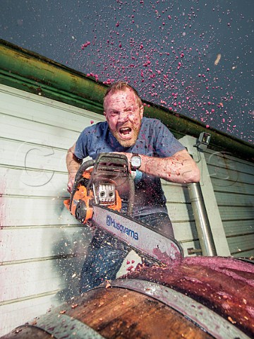 Grant Phelps chainsaws a barrel of wine Casas del Bosque Casablanca Valley Chile