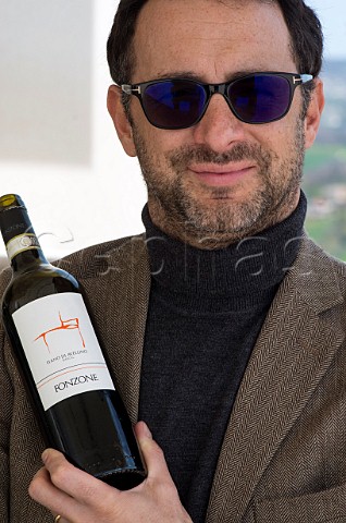 Amadeo de Palma with a bottle of his Fonzone Fiano di Avellino Paternopoli Campania Italy