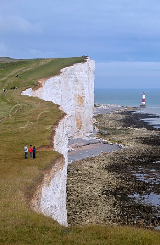 People on the South Downs Way footpath near Beachy Head Eastbourne Sussex England