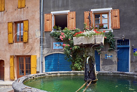 Fountain in the medieval village of Conflans  Albertville Savoie France