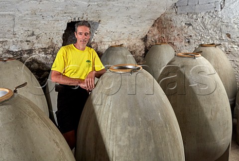 Dominique Belluard died 2021 with the concrete eggs that he uses to age his wines Ayze and Roussette de Savoie les Grandes Jorasses  Domaine Belluard Ayze HauteSavoie France