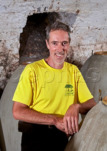 Dominique Belluard died 2021 with the concrete eggs that he uses to age his wines  Ayze and Roussette de Savoie les Grandes Jorasses  Domaine Belluard Ayze HauteSavoie France