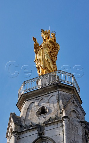 Golden statue of the Virgin Mary on the tower of Le Sanctuaire NotreDame de Myans  Savoie France