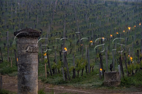 Oil burning smudge pots in vineyard of Chteau Ausone during subzero temperatures of April 2017 Stmilion Gironde France Saintmilion  Bordeaux