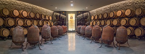 Barriques and amphorae in cellar of Chteau Les Carmes HautBrion Pessac Gironde France PessacLognan  Bordeaux