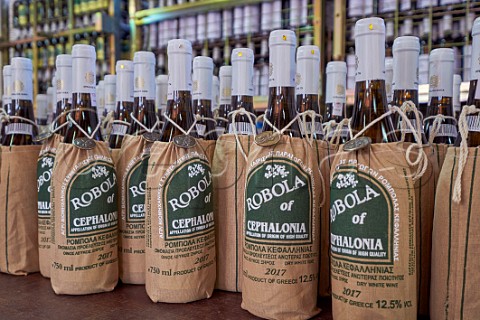 Bottles of Robola in traditional canvas sacks in the winery of the Robola Wine Cooperative Omala Valley Cephalonia Ionian Islands Greece